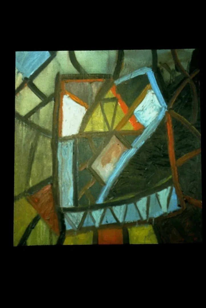 A painting of a geometric design in stained glass.