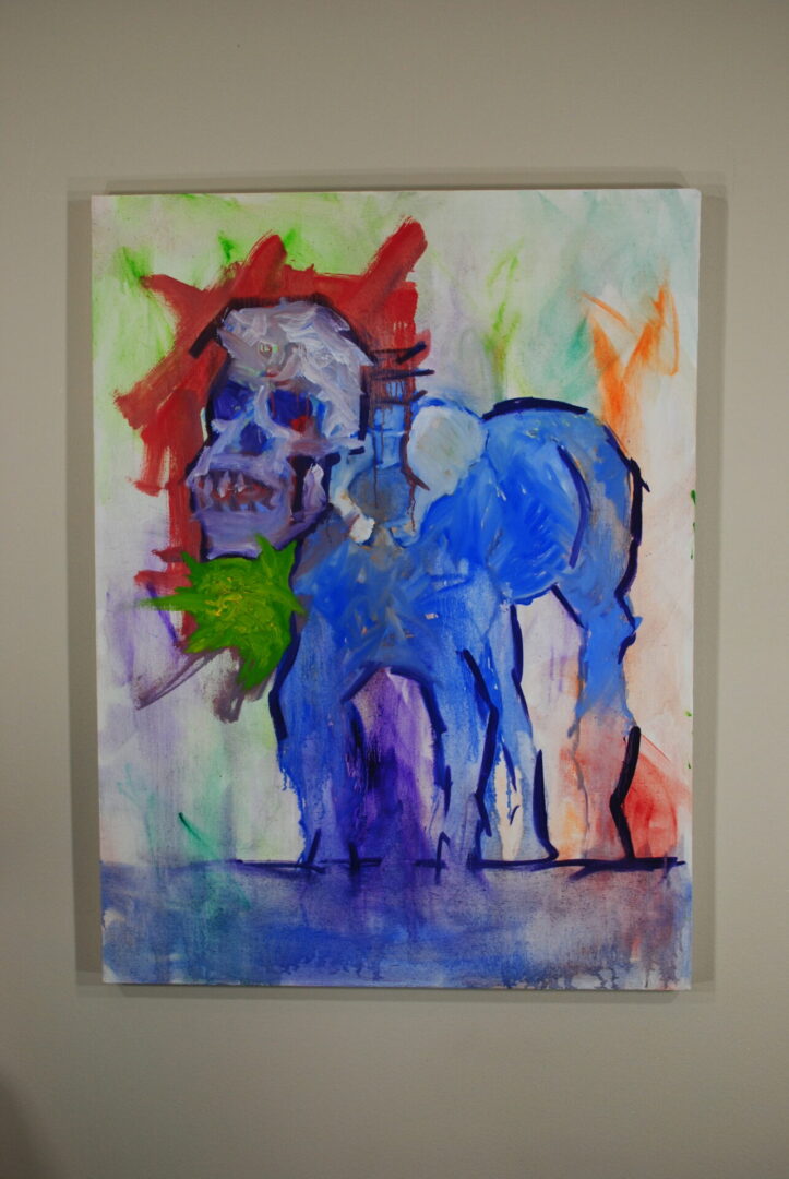 A painting of a horse with a skull on its head.